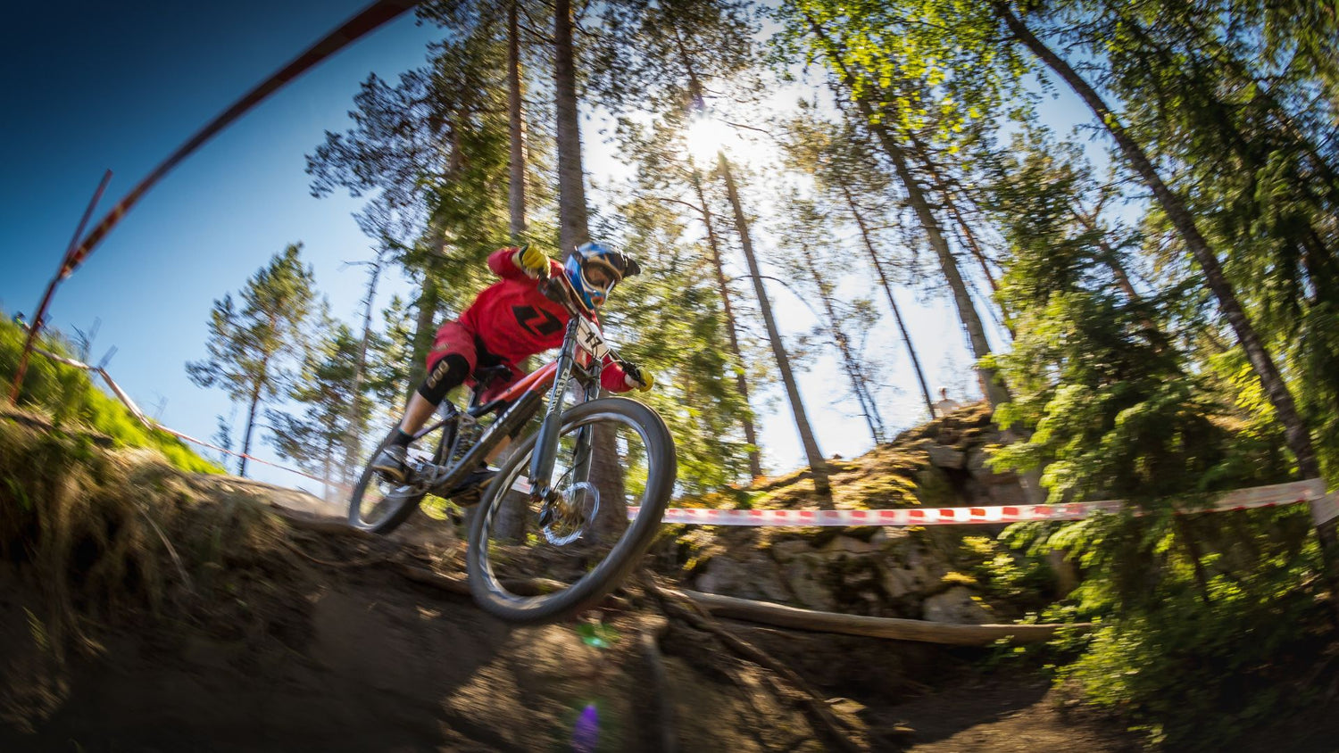 Person mountain biking