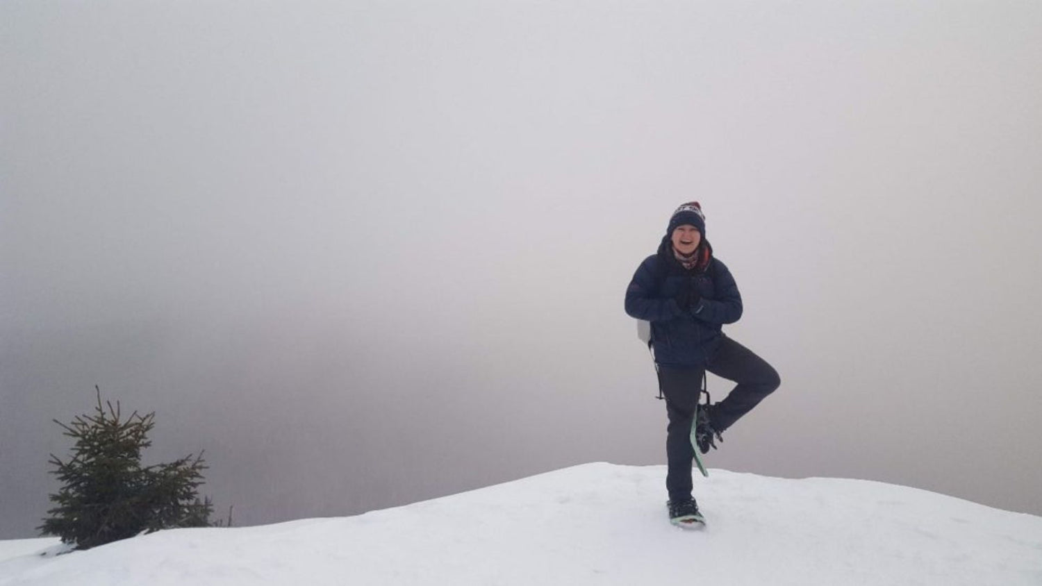Woman doing yoga while hiking