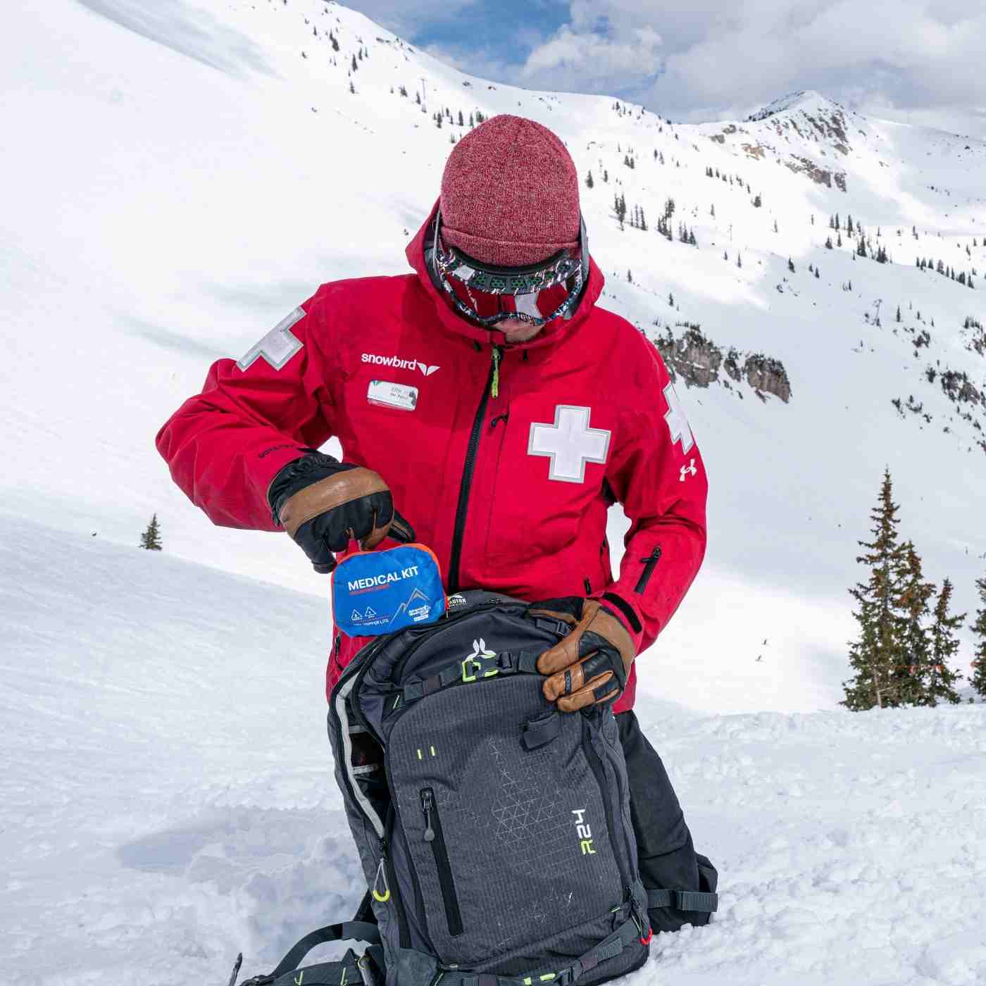 Mountain Series Medical Kit - Day Tripper Lite Ski Patrol pulling from pack