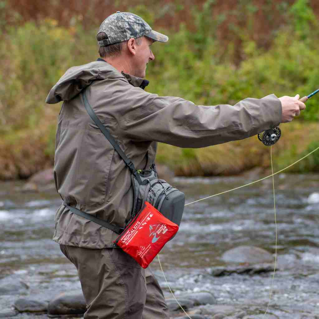 Sportsman Series Medical Kit - 100 fisherman fishing with kit attached to hip