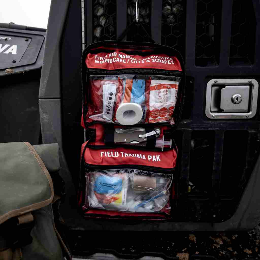 Sportsman Series Medical Kit - 300 kit opened on dog kennel on truck