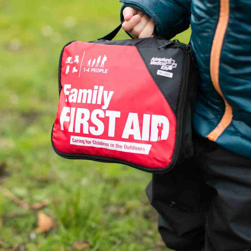 Adventure First Aid, Family First Aid Kit close up of kit in child's hand