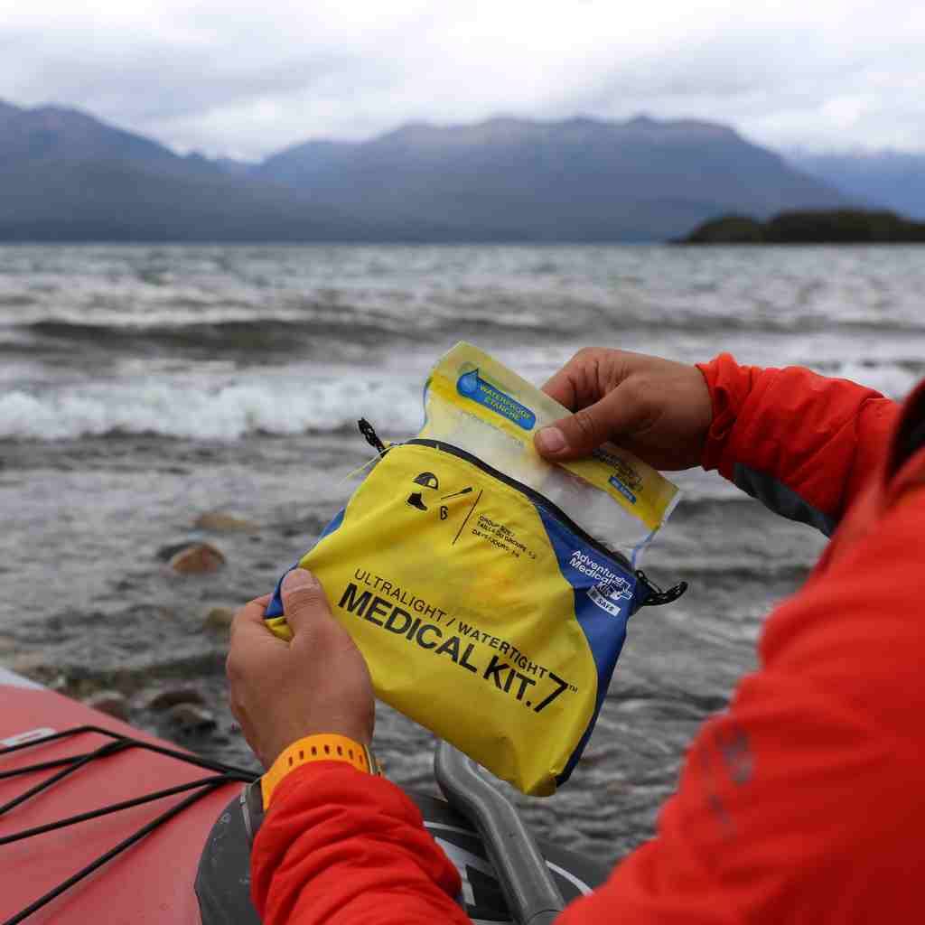 Ultralight/Watertight Medical Kit - .7 kayaker opening kit while kayaking