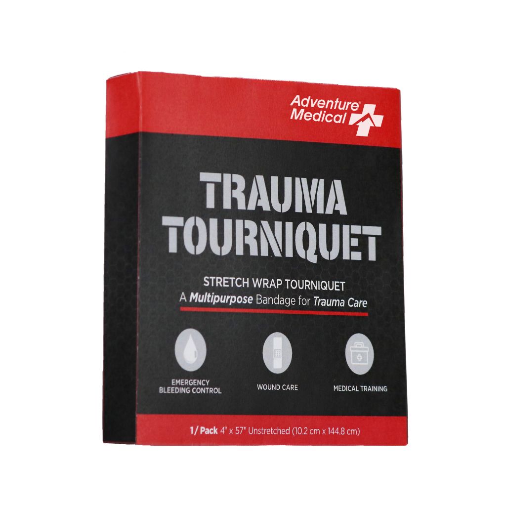 Adventure Medical Trauma Tourniquet stretch wrap tourniquet box packaging, featuring a black and red design with white text, on a plain white background.