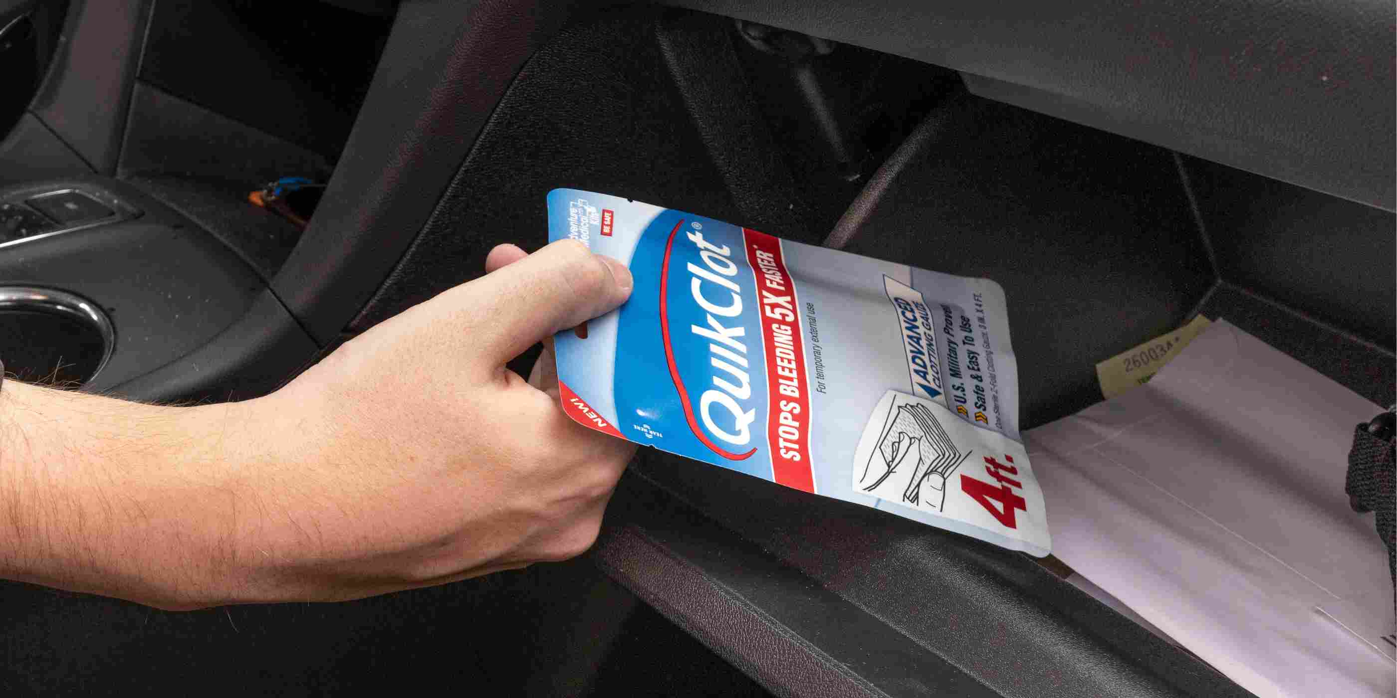 QuikClot Gauze 4 Foot pulling from glove box