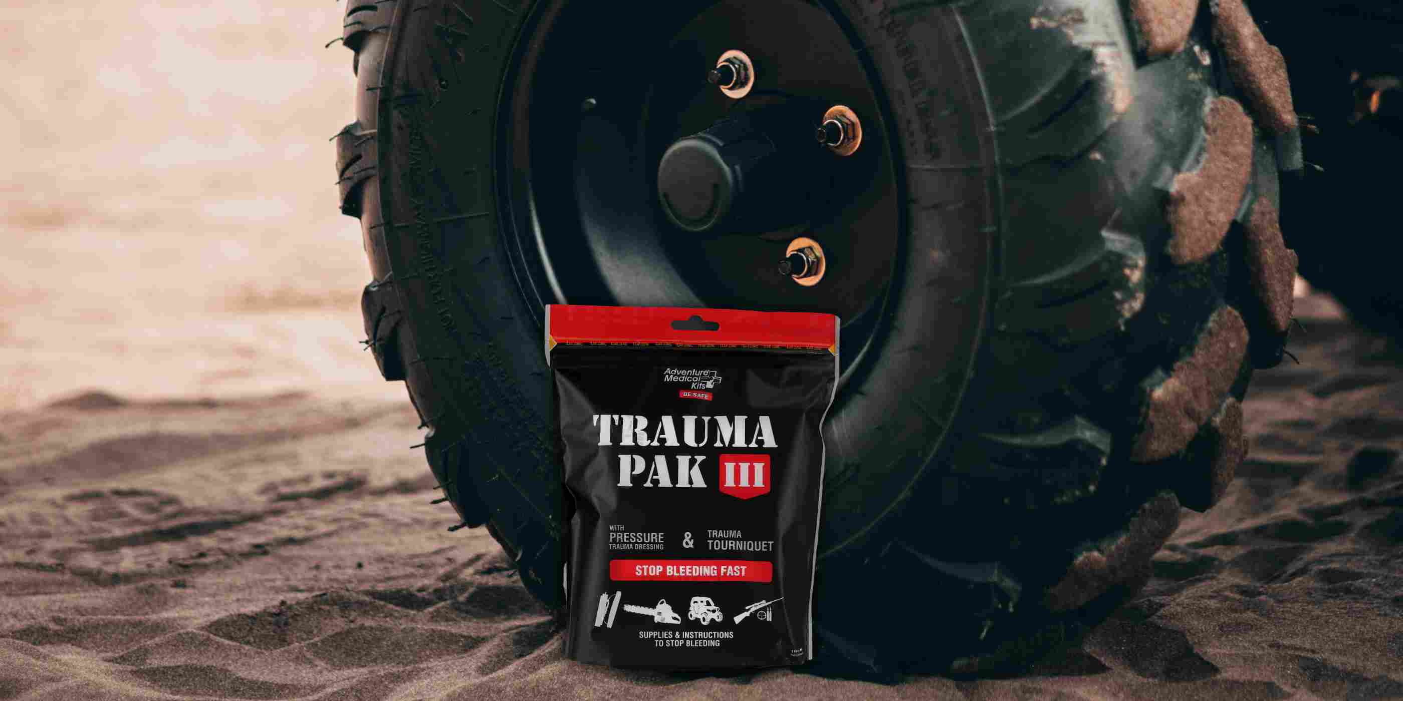 Trauma Pak III in front of truck tire