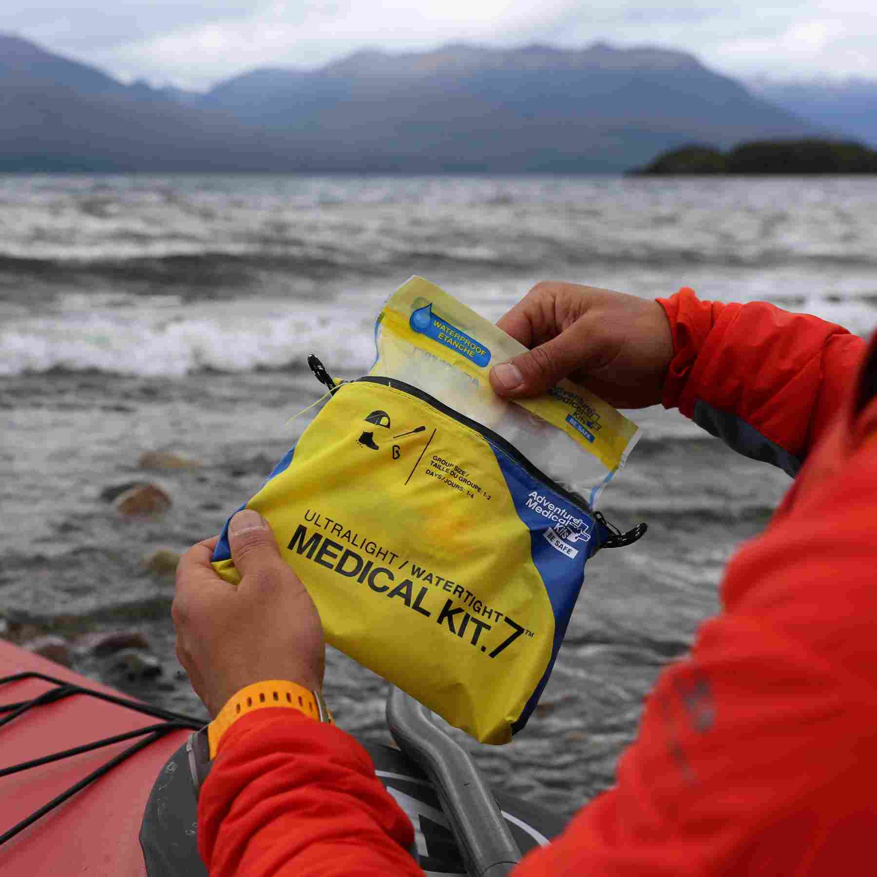 Ultralight/Watertight Medical Kit - .7 kayaker opening kit while kayaking