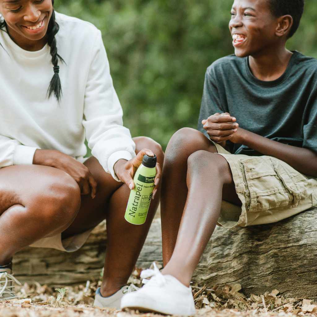 Natrapel Lemon Eucalyptus Tick & Insect Repellent Eco-Spray 6 oz. mom about to spray on son's leg