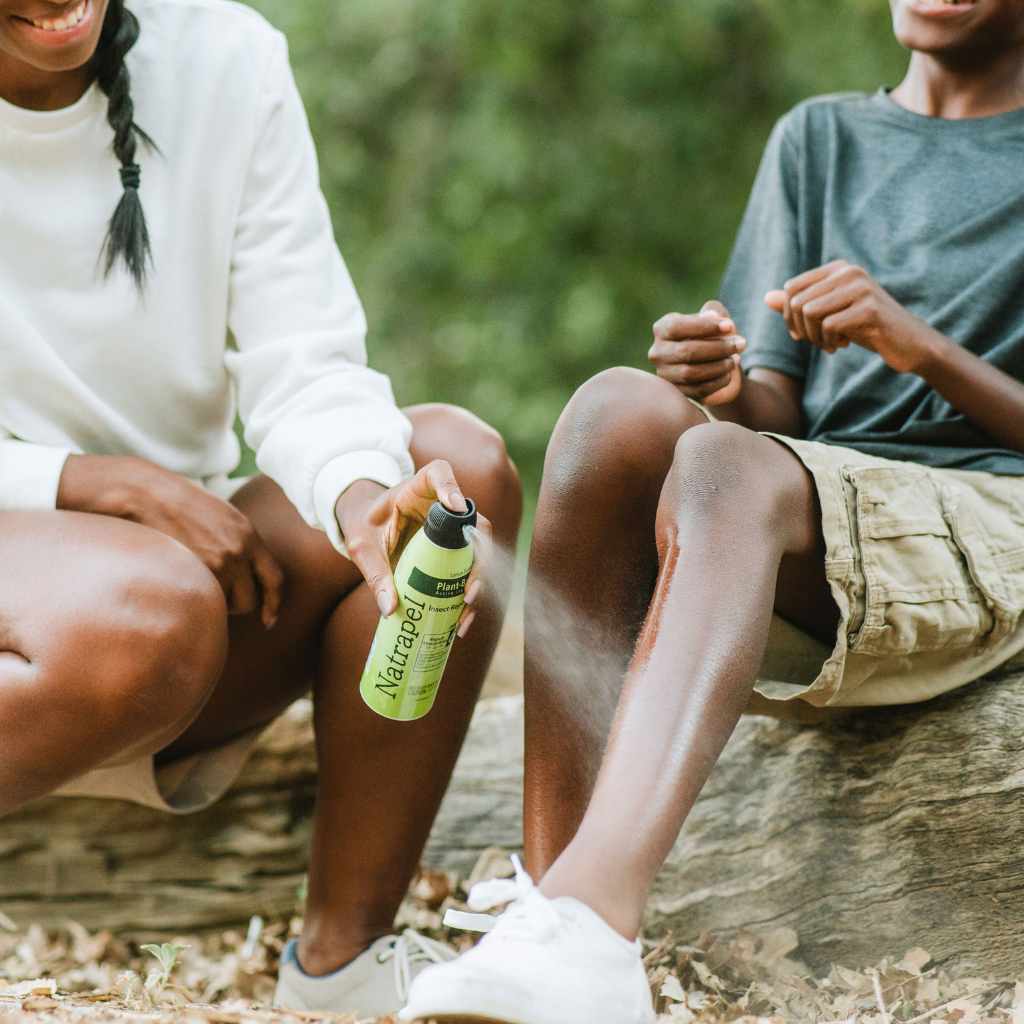 Natrapel Lemon Eucalyptus Tick & Insect Repellent Eco-Spray 6 oz. mom spraying on son's leg