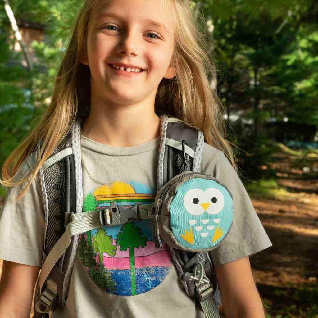 Backyard Adventure Owl First Aid Kit kit on girl's backpack