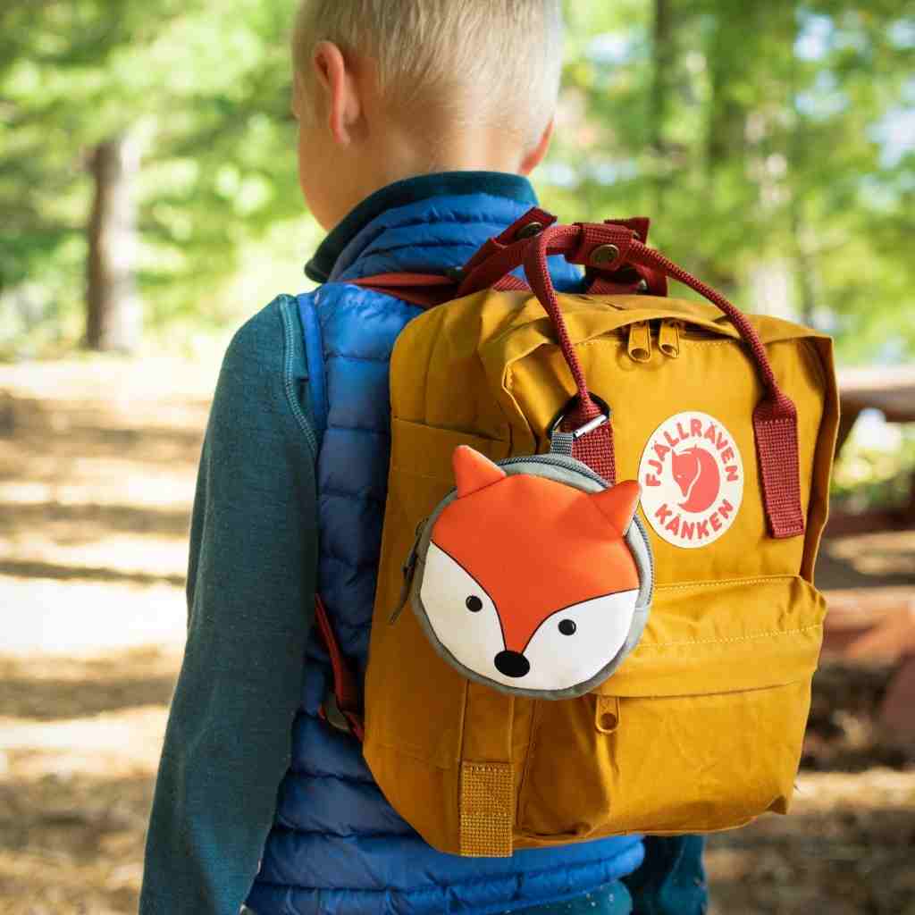 Backyard Adventure Fox First Aid Kit attached to child's backpack