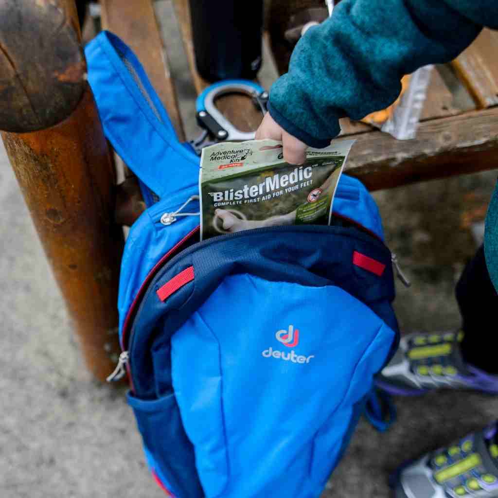 Blister Medic Kit child removing kit from blue bag