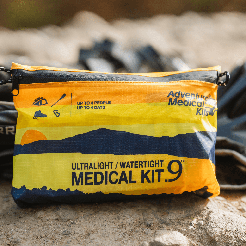 Ultralight / Watertight Medical Kit .9 lifestyle image with outdoor gear