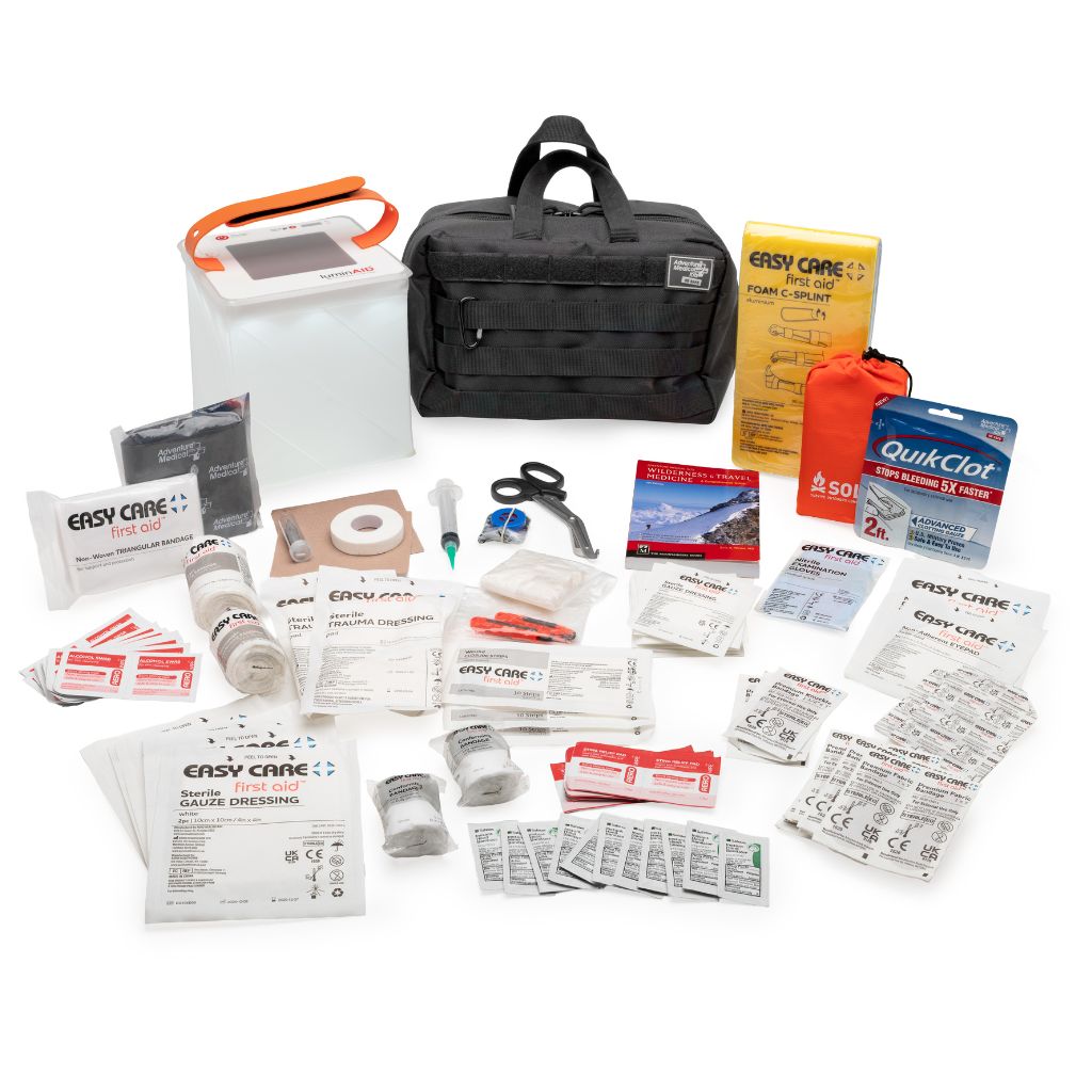 MOLLE Pro first aid kit with supplies on a white background