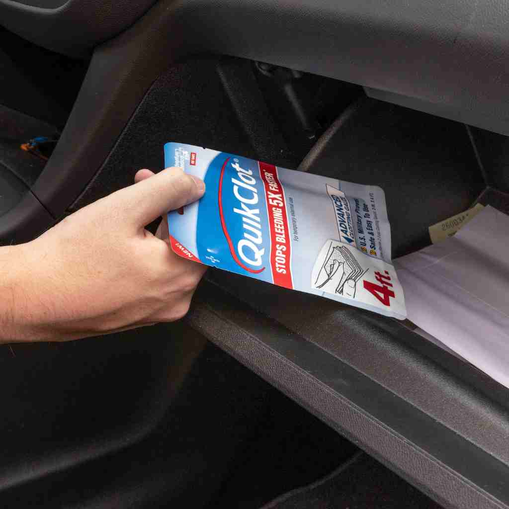 QuikClot Gauze 4 Foot pulling from glove box