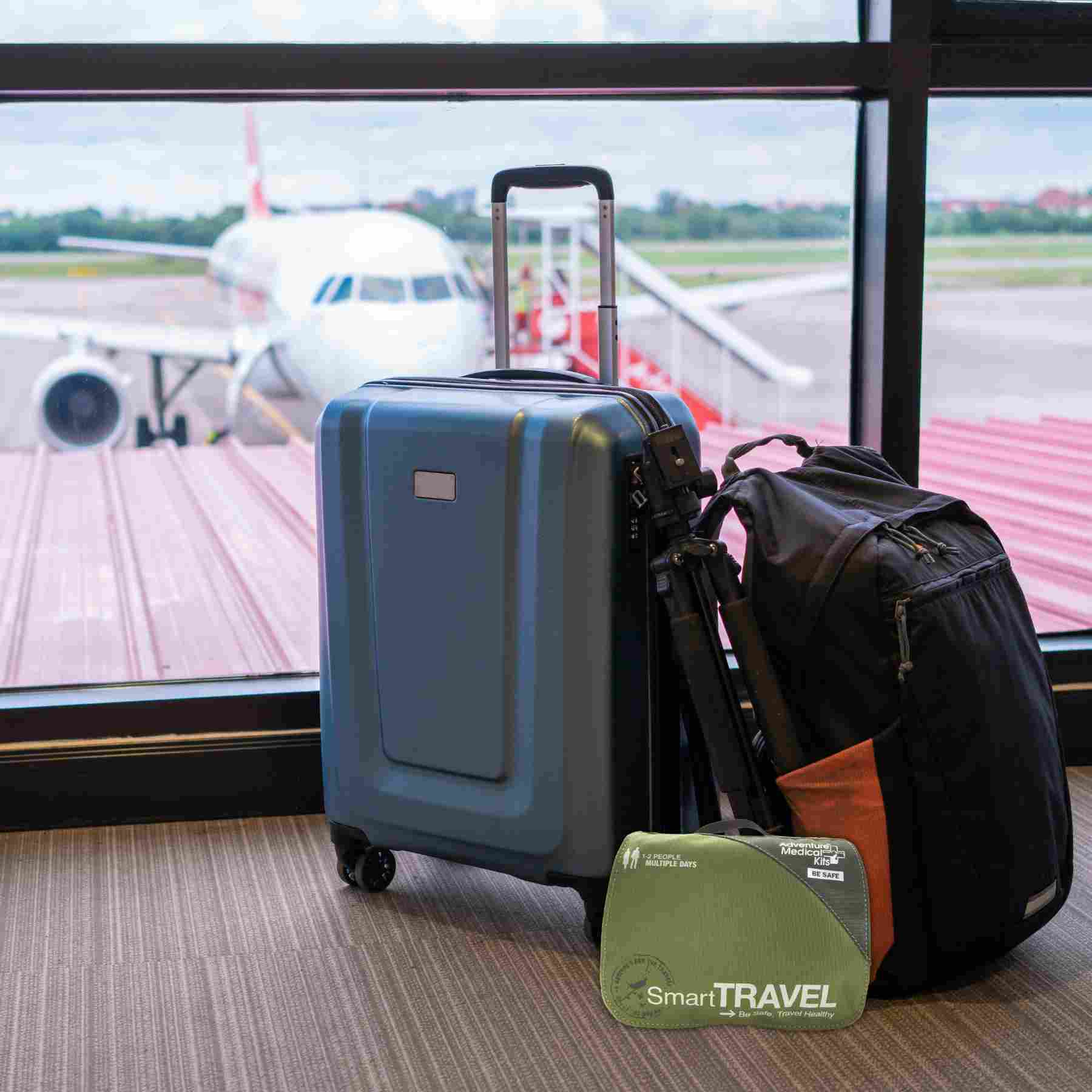 Travel Series Medical Kit - Smart Travel in front of luggage