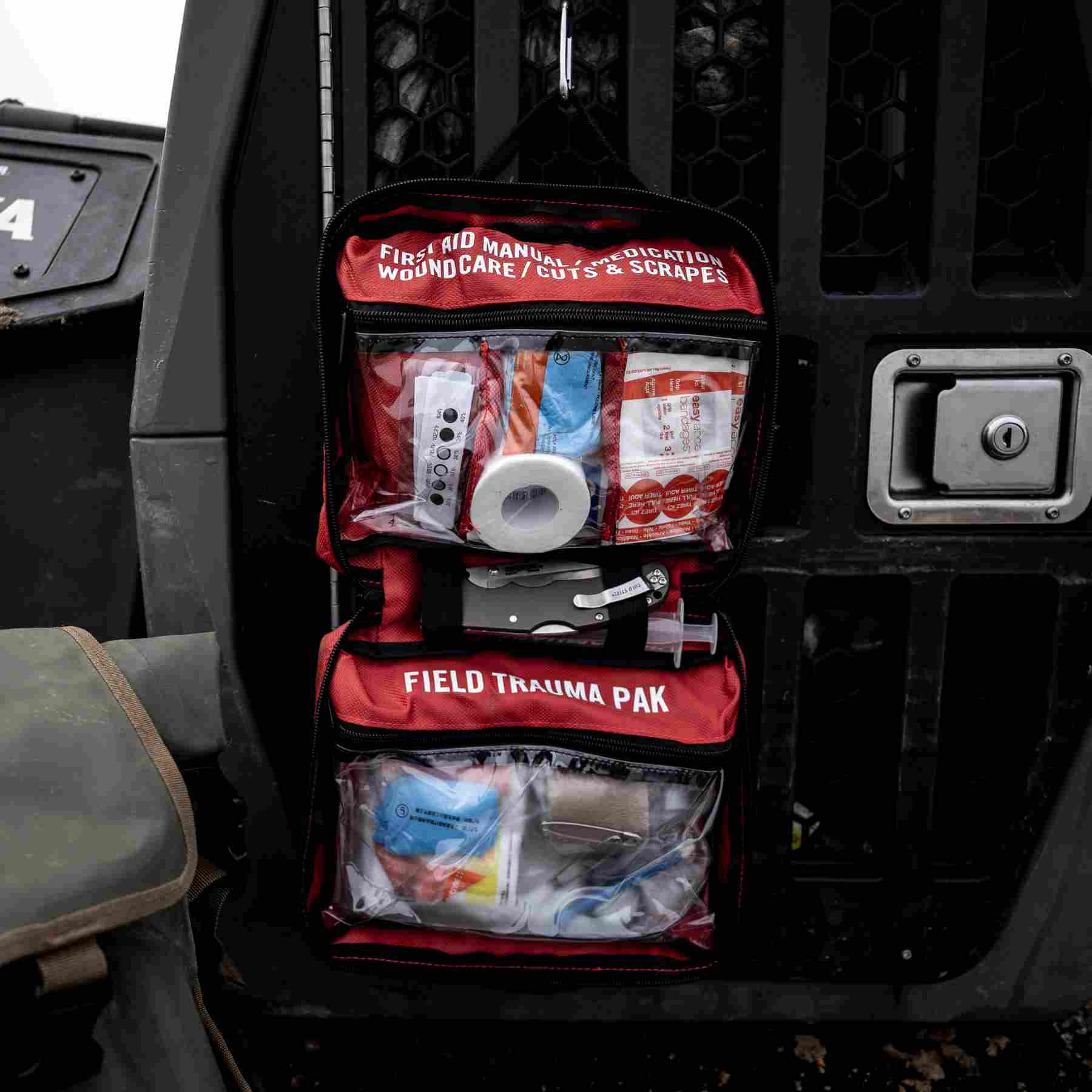 Sportsman Series Medical Kit - 300 kit opened on dog kennel on truck