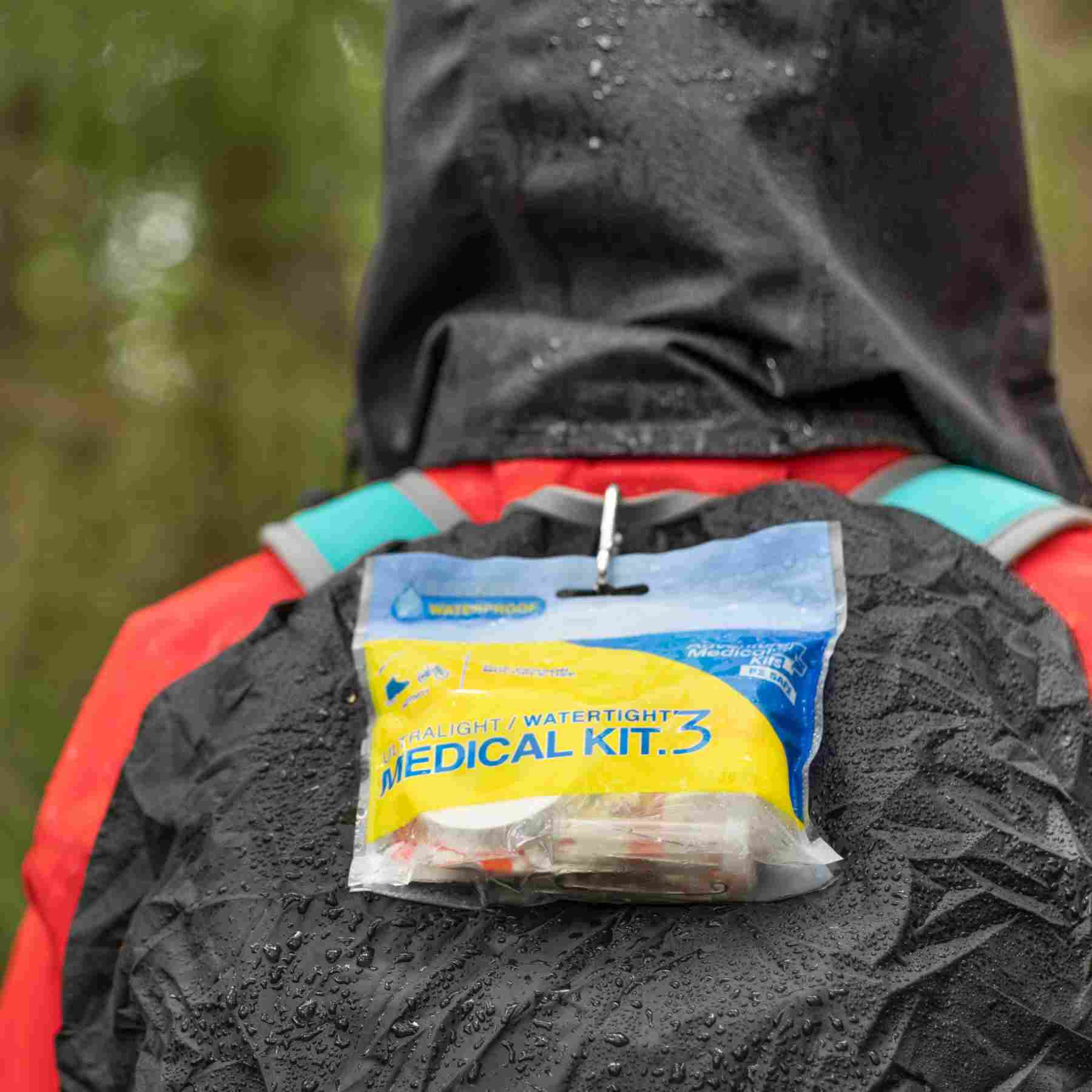 Ultralight/Watertight Medical Kit - .3 wet kit attached to hiker backpack