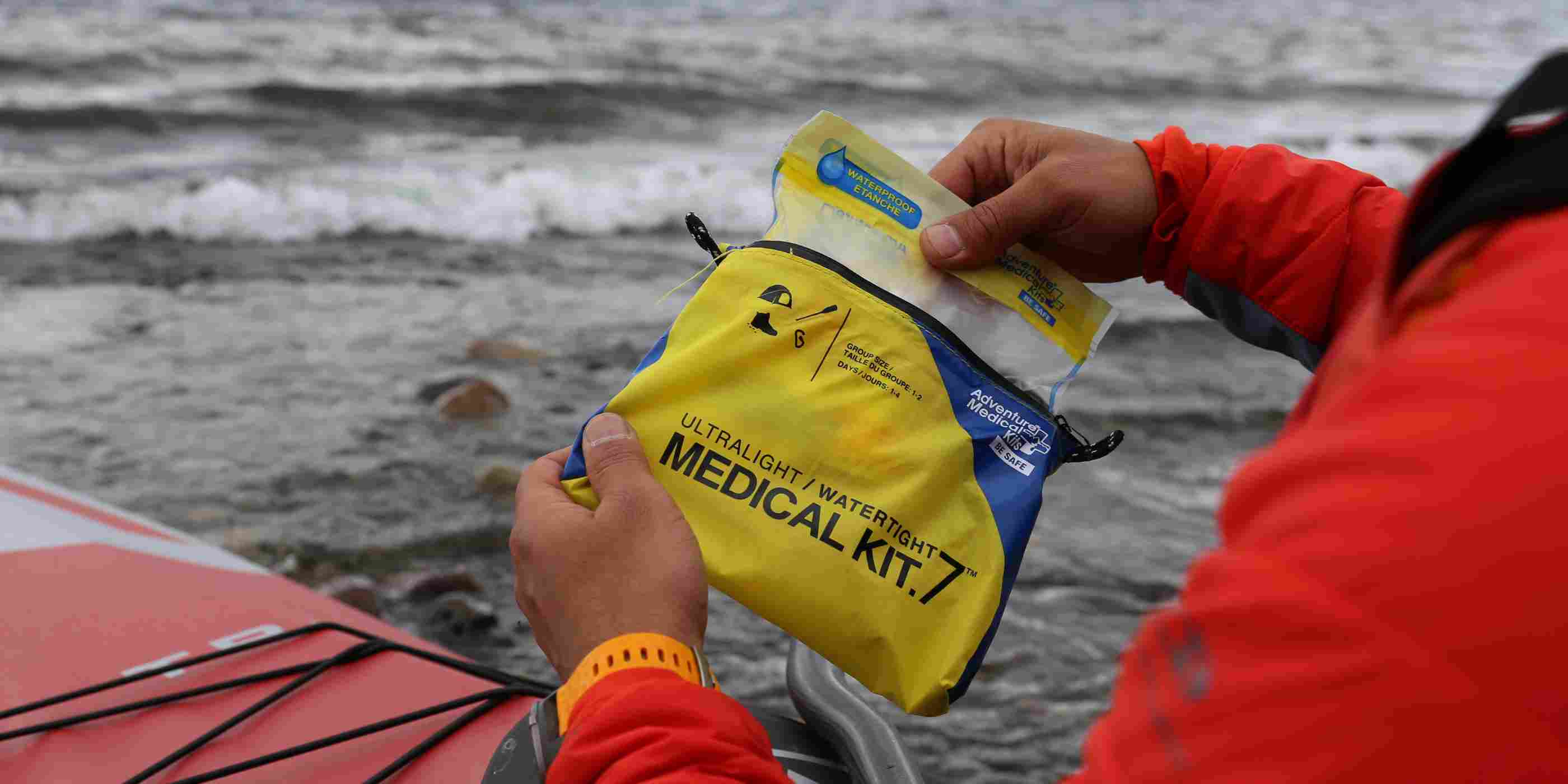 Ultralight/Watertight Medical Kit - .7 kayaker opening kit while kayaking